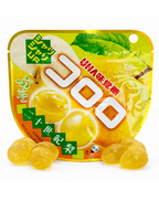 Japanese Kororo fruit juice gummies 20th century pear flavor gummy candy UHA Mikakuto on white background